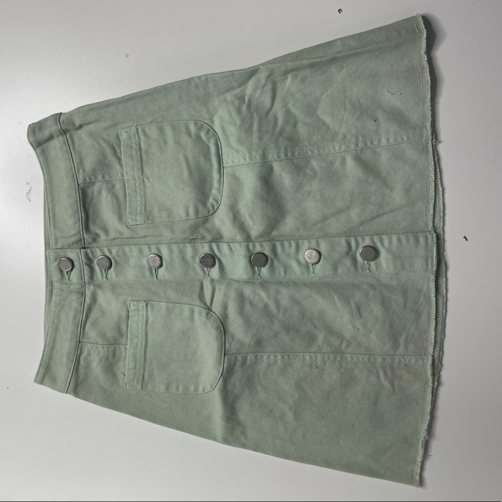 Sage green mini skirt, size extra small, in perfect condition never worn
